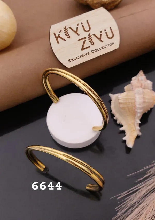 Elegant_Gold-Plated_Adjustable_Bangle_With_White_Accent