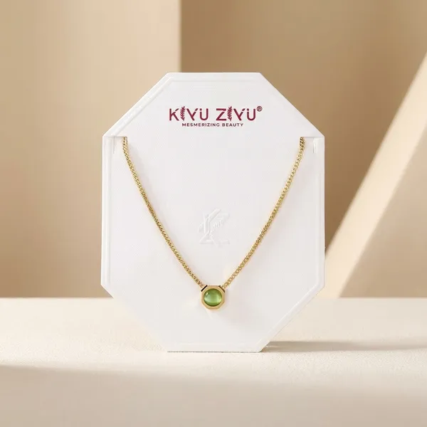 Kivu_Zivu_Gold-Toned_Chain_Necklace_With_Green_Stone_Pendant