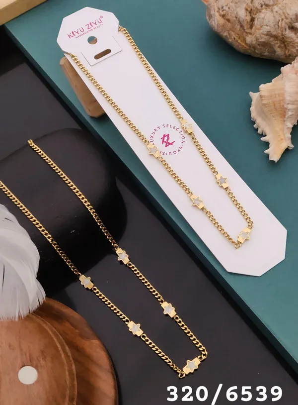 Gold-Tone_Chain_Necklace_With_Star_Charms