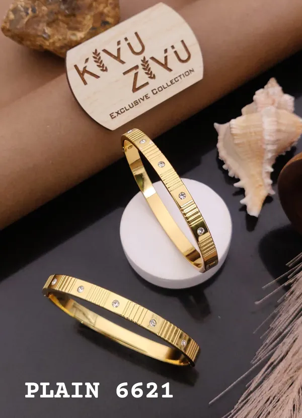 Elegant_Gold-Tone_Bangle_Bracelet_Set_With_Crystal_Embellishments_-_Kavu_Zivu_Exclusive_Collection