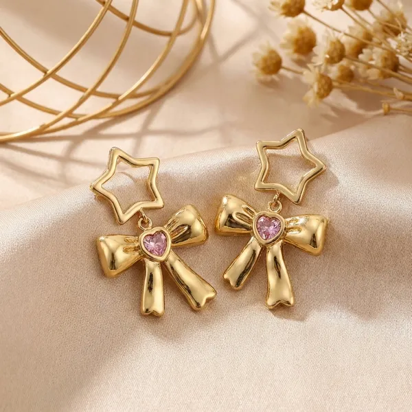 Golden_Star_And_Bow_Stud_Earrings_With_Pink_Stone_-_Kyuzizu