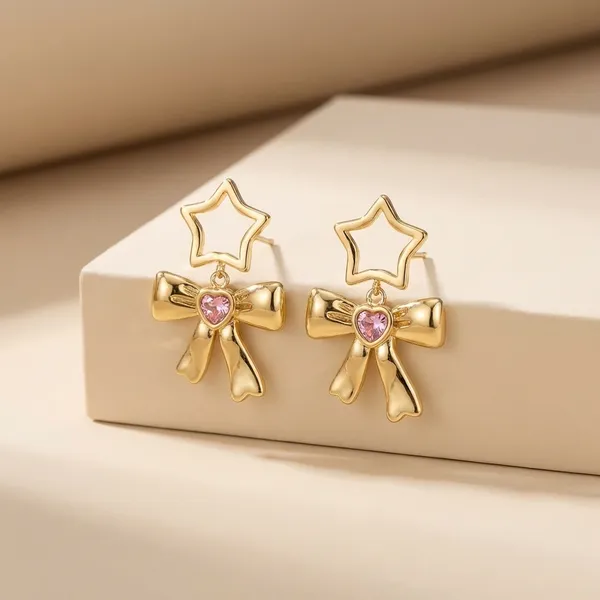 Golden_Star_And_Bow_Stud_Earrings_With_Pink_Stone_-_Kyuzizu