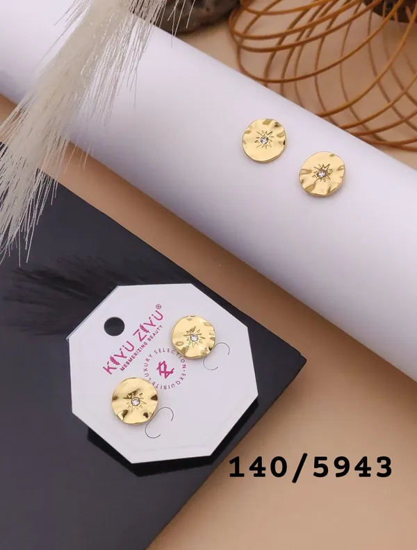 Gold_Starburst_Stud_Earrings_With_Crystal_Center