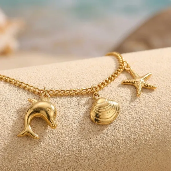 Kiyu_Viyu_Exclusive_Collection_Beach-Themed_Charm_Anklet_Set_-_Gold-Toned_Shell_&_Dolphin_Design