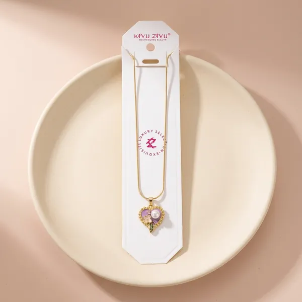 Sparkling_Heart-Shaped_Pendant_Necklace_With_Purple_Stone