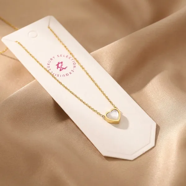 Heart-Shaped_White_Stone_Pendant_Necklace_With_Gold_Chain