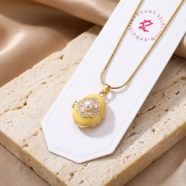 Sparkling_Heart_Locket_Pendant_Necklace_-_Set_Of_3_Elegant_Gold-Tone_Chains_With_Crystal_Embellishments