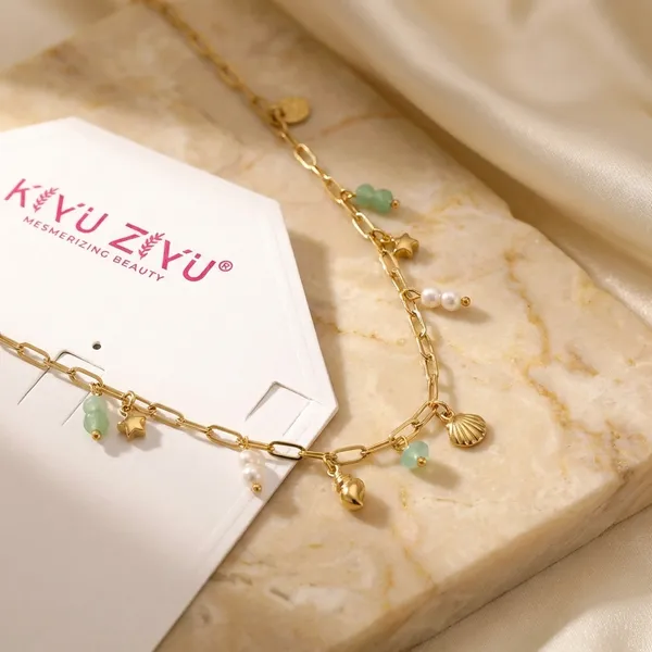 Golden_Charm_Necklace_With_Turquoise_Beads_And_Shell_Pendants
