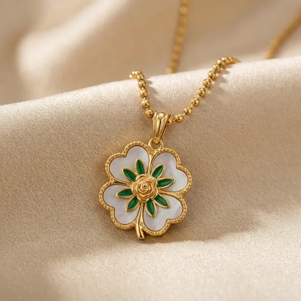 Elegant_Quatrefoil_Clover_Pendant_Necklace_With_Mother_Of_Pearl_And_Green_Crystal_Accents
