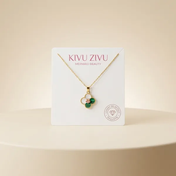 Elegant_Quatrefoil_Clover_Pendant_Necklace_With_Mother_Of_Pearl_And_Green_Crystal_Accents