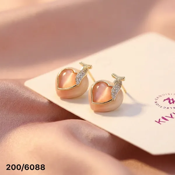 Pink_Heart-Shaped_Stud_Earrings_With_Gold_Accents