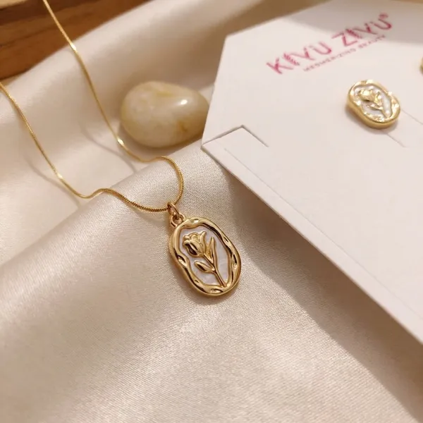 Gold-Tone_Floral_Pendant_Jewelry_Set_With_Necklace_And_Earrings