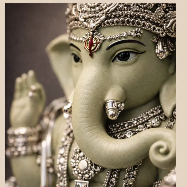 Green_Leaf_Silver_Plated_Ganesha_Idol_For_Home_Temple_&_Gifting