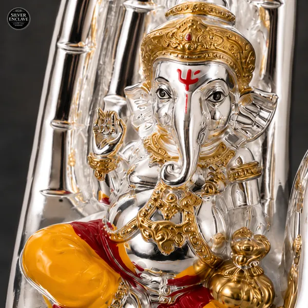 Yellow_Silver_Plated_Palm_Ganesh_Idol_For_Home_Temple,_Pooja_Decor_&_Festive_Gifting