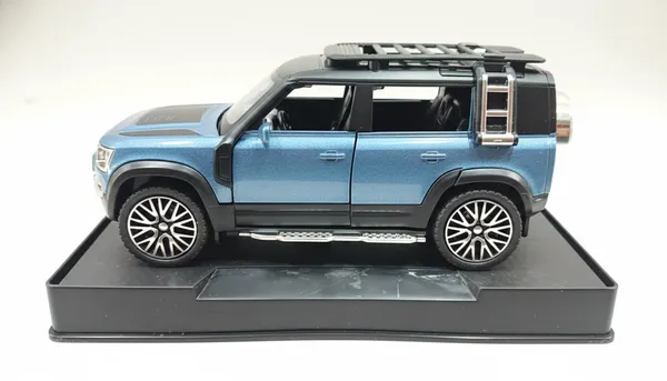 Blue_And_Black_Metal_Car_Defender_Model