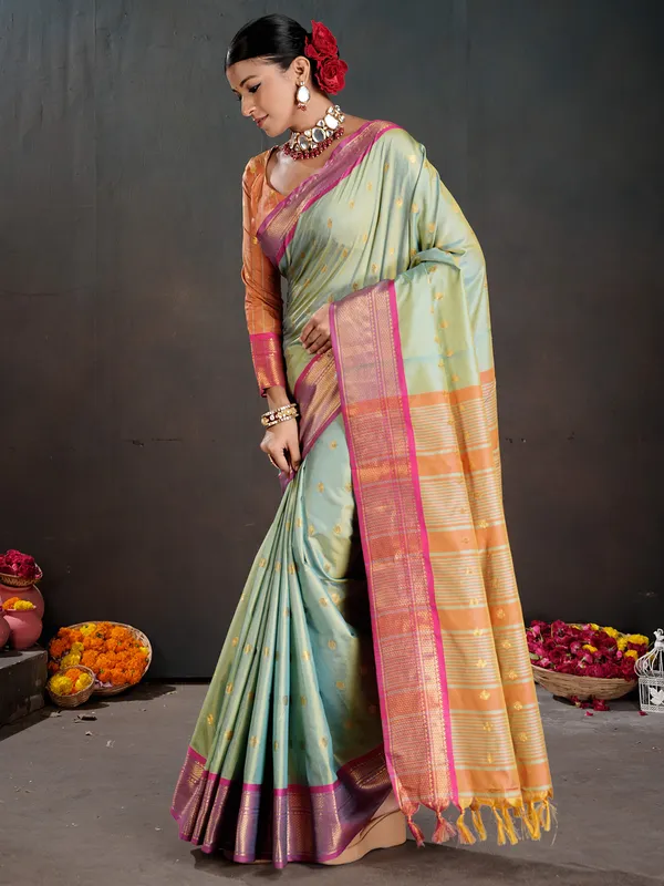 Women's_Silk_Blend_Aqua_Blue_Woven_Design_Designer_Saree_With_Blouse_Piece