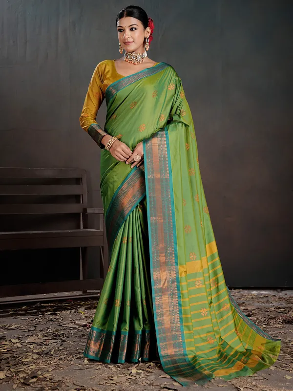 Women's_Silk_Blend_Green_Woven_Design_Designer_Saree_With_Blouse_Piece