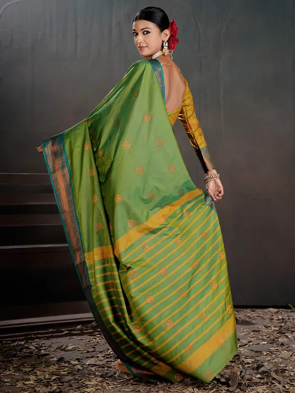 Women's_Silk_Blend_Green_Woven_Design_Designer_Saree_With_Blouse_Piece