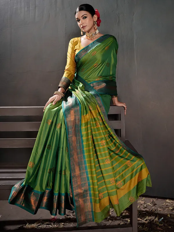 Women's_Silk_Blend_Green_Woven_Design_Designer_Saree_With_Blouse_Piece