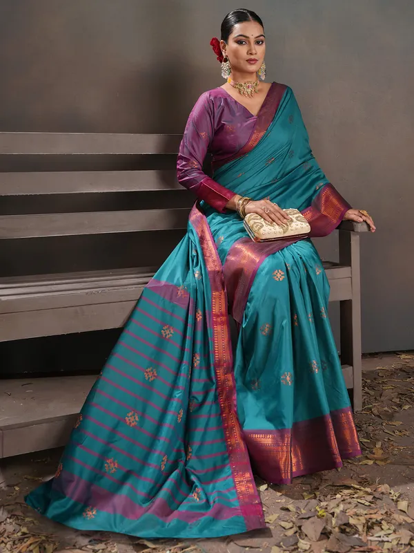 Women's_Silk_Blend_Turquoise_Woven_Design_Designer_Saree_With_Blouse_Piece