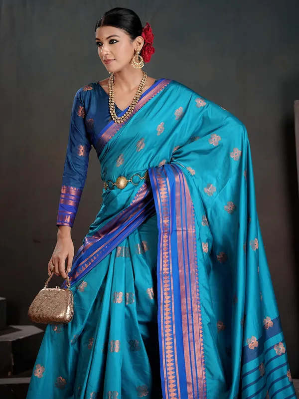 Women's_Silk_Blend_Turquoise_Woven_Design_Designer_Saree_With_Blouse_Piece