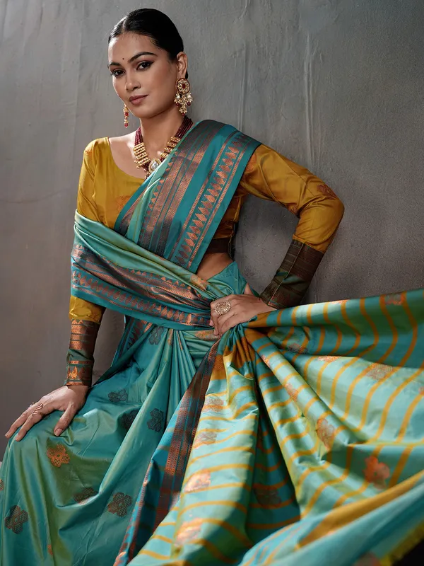 Women's_Silk_Blend_Sea_Green_Woven_Design_Designer_Saree_With_Blouse_Piece