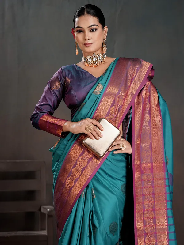 Women's_Silk_Blend_Turquoise_Woven_Design_Designer_Saree_With_Blouse_Piece