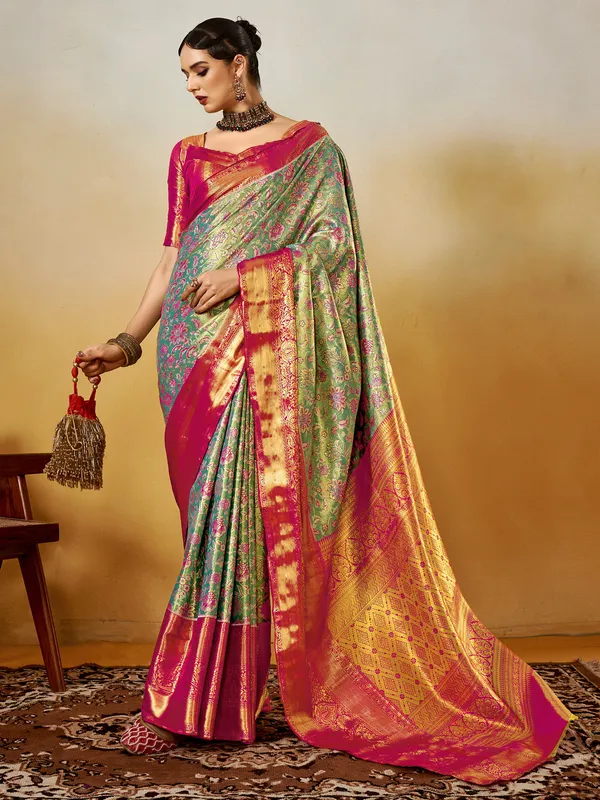 Women's_Silk_Blend_Turquoise_Woven_Design_Designer_Saree_With_Blouse_Piece