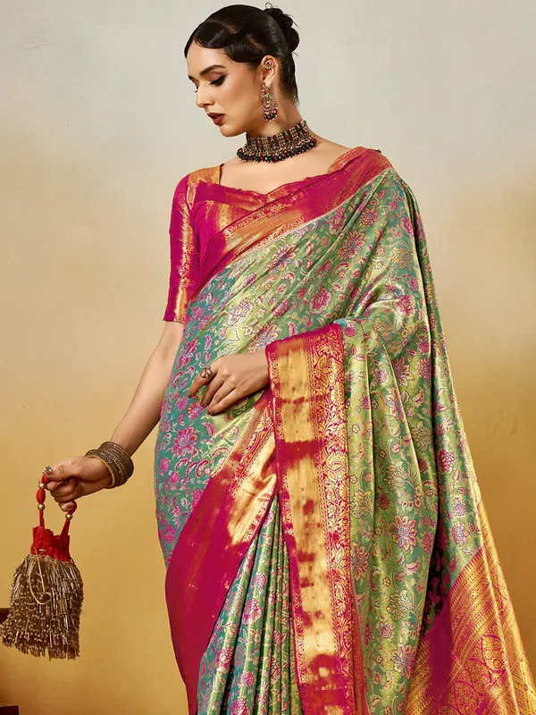 Women's_Silk_Blend_Turquoise_Woven_Design_Designer_Saree_With_Blouse_Piece