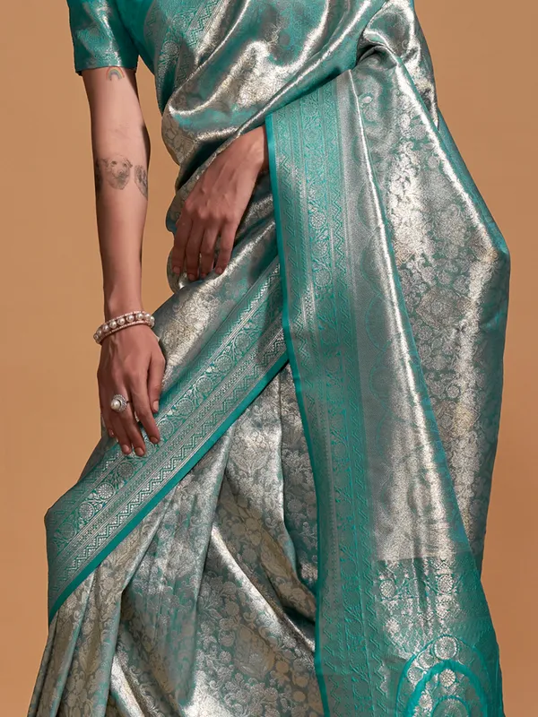 Women's_Kanjeevaram_Silk_Light_Blue_Woven_Design_Designer_Saree_With_Blouse_Piece