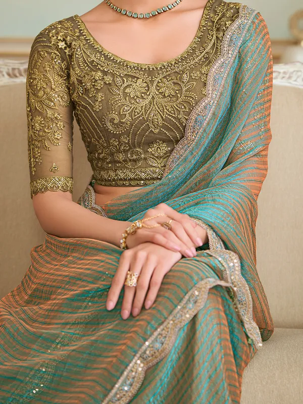 Women's_Georgette_Light_Green_Embellished_Designer_Saree_With_Blouse_Piece