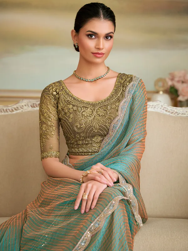 Women's_Georgette_Light_Green_Embellished_Designer_Saree_With_Blouse_Piece