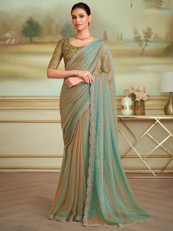 Women's_Georgette_Light_Green_Embellished_Designer_Saree_With_Blouse_Piece