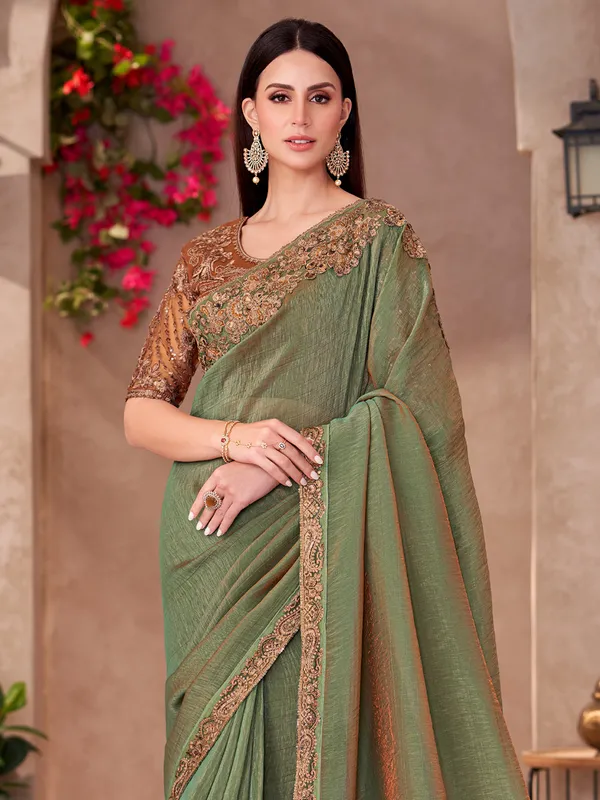 Women's_Georgette_Light_Green_Embellished_Designer_Saree_With_Blouse_Piece