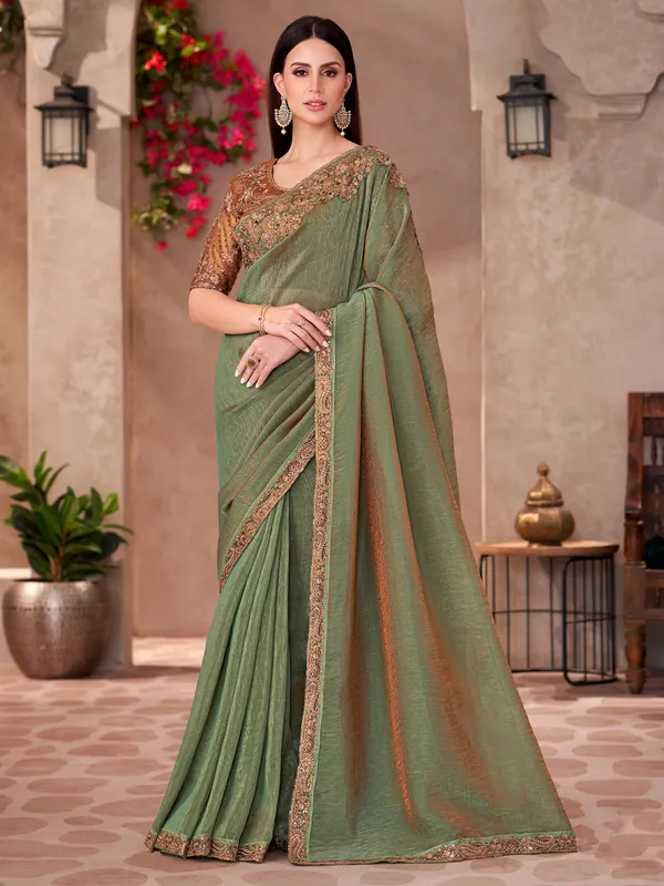 Women's_Georgette_Light_Green_Embellished_Designer_Saree_With_Blouse_Piece