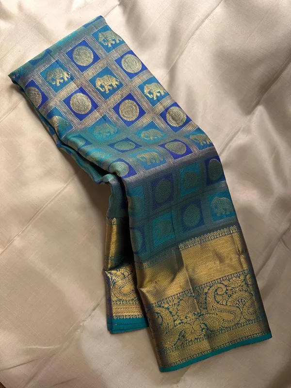 Banarasi_Soft_Silk_RAMA_Premium-Fancy_Saree_With_Blouse_For_Women