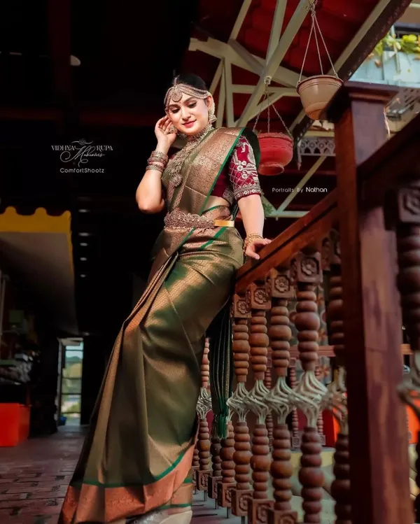 Banarasi_Soft_Silk_BOTTLE-GREEN_Premium-Fancy_Saree_With_Blouse_For_Women
