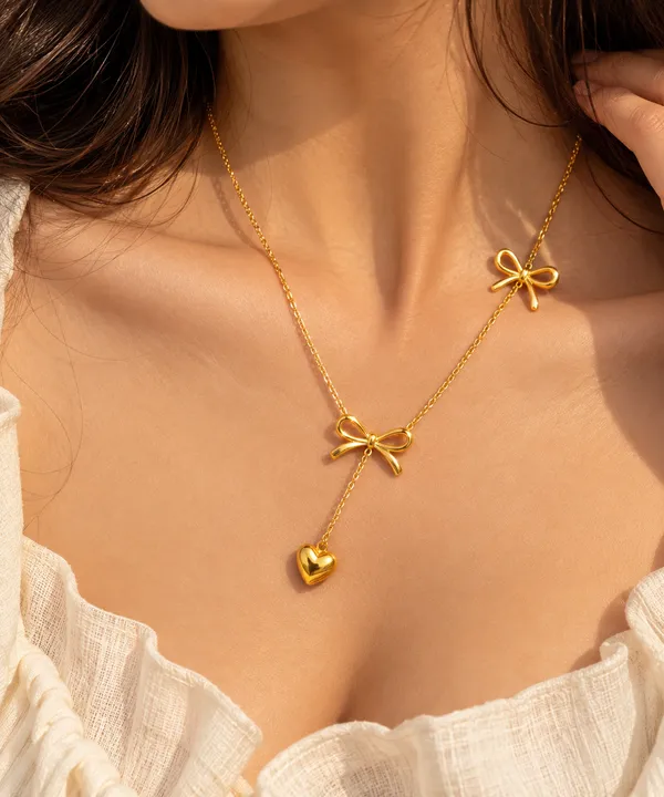 The_Golden_Butterfly_Bow_Set_Bow_Necklace_+_Butterfly_Ring_+_Butterfly_Bracelet