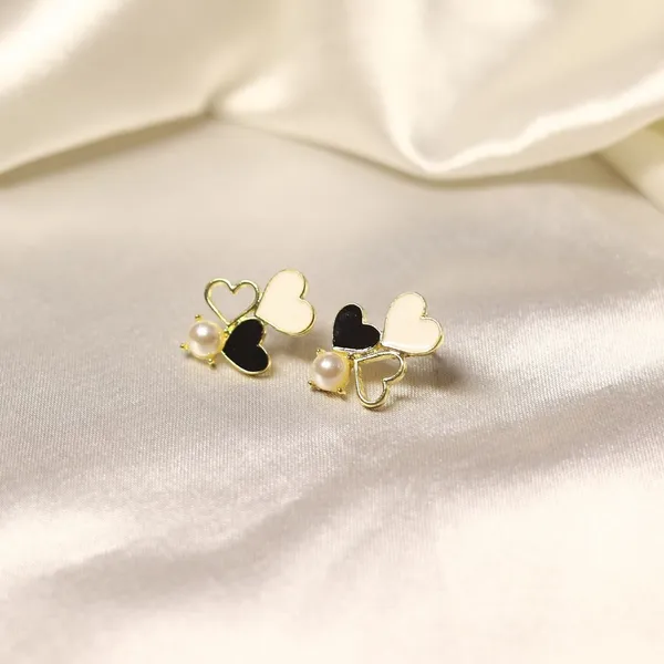 Golden_Stainless_Steel_Trio_Heart_Studs_For_Women