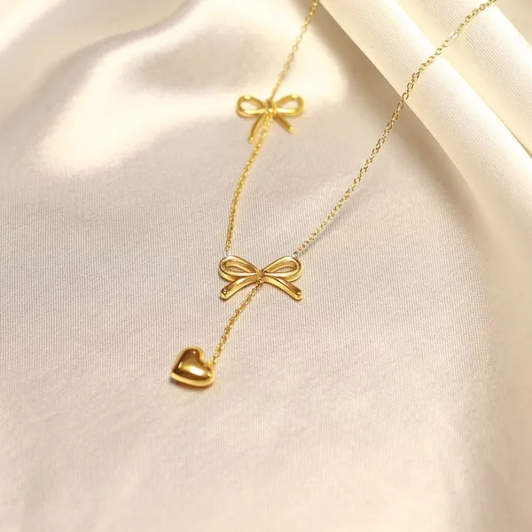 Golden_Stainless_Steel_Charm_Knot_18K_Gold_Pendant_For_Women