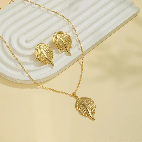 Golden_Stainless_Steel_Winged_Grace_Necklace_With_Earring_Set_For_Women