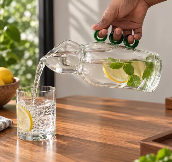 Upcycled_Clear_Glass_Jug_with_Green_Three-Ring_Handle_–_700_ML_|_Made_from_Camino_Tequila®_Bottle