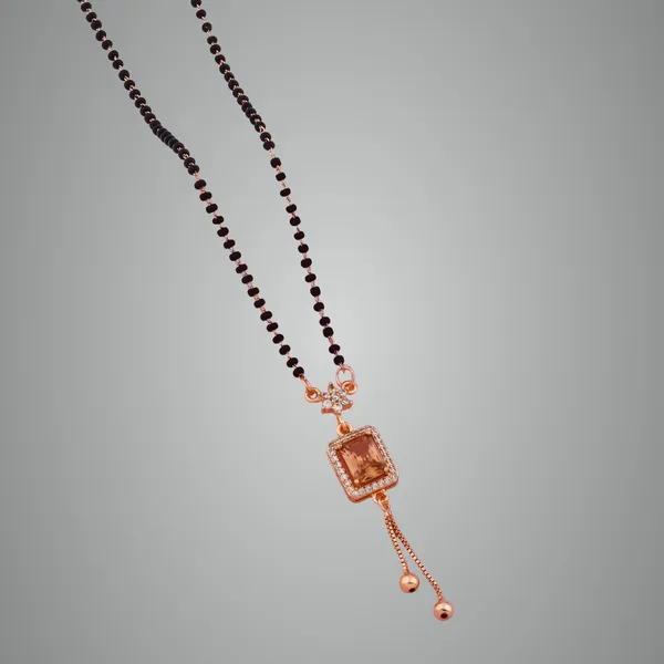 Golden_Elegant_Beads_Mangalsutra_With_Champagne_Stone_Pendant_And_Finish_Drop_Design_For_Women