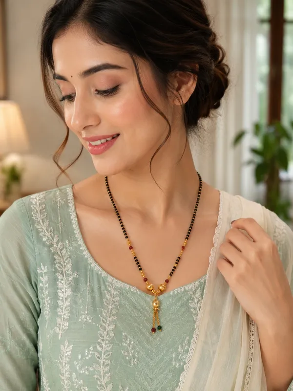 Premium_1_GM_Gold_Plated_Black_Bead_Mangalsutra_with_Maroon_Crystal_Beads_&_Designer_Tassel_Pendant