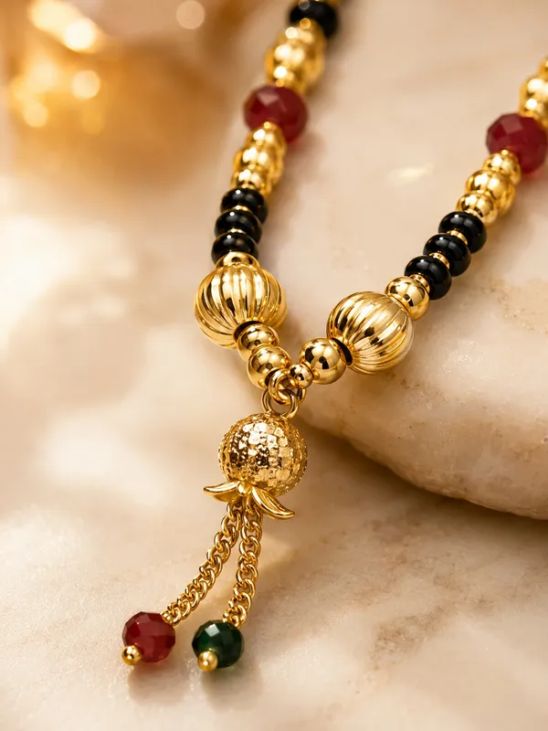 Premium_1_GM_Gold_Plated_Black_Bead_Mangalsutra_with_Maroon_Crystal_Beads_&_Designer_Tassel_Pendant
