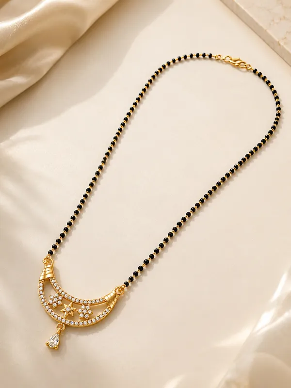 Premium_1_Gram_Gold_Plated_Floral_CZ_Mangalsutra_Chain_–_20_Inch_Traditional_Black_Bead_Necklace_with_Hanging_Drop
