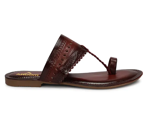 A_pair_of_stylish_women�s_slip-on_loafers_in_a_warm_tan/brown_color_with_a_subtle_ribbed_texture.