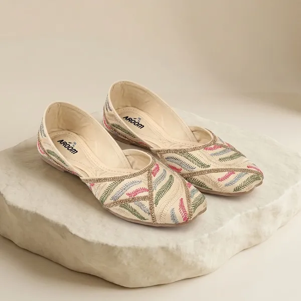 Cream_Elegant_Embroidered_Ethnic_Jutti_For_Women_With_Bead_Detailing_And_Comfortable_Flat_Sole