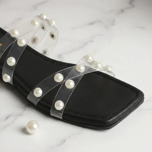 Black_Elegant_Slip_On_Sandals_With_Pearl_Studded,_Soft_Padded_Insole,_And_Large_Decorative_Front
