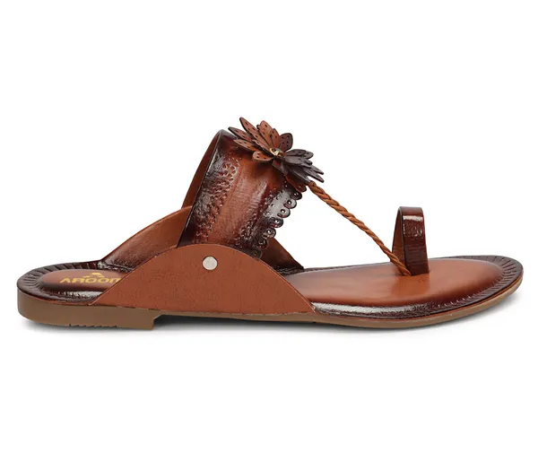 A_pair_of_stylish_women�s_slip-on_loafers_in_a_warm_tan/brown_color_with_a_subtle_ribbed_texture.